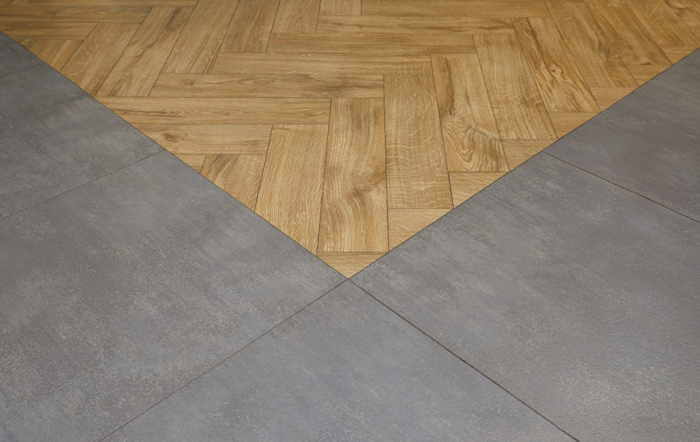 Metropolis Smoke, laid in Uniform Tile, also from the Amtico Spacia 36+ safety floor collection.